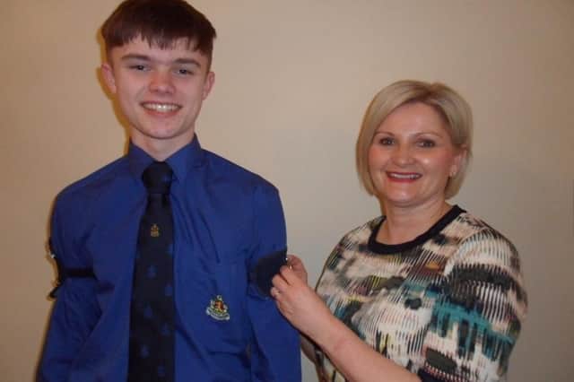 Adam Faulkner gained the Queens Badge which was presented to him by his mother Christina