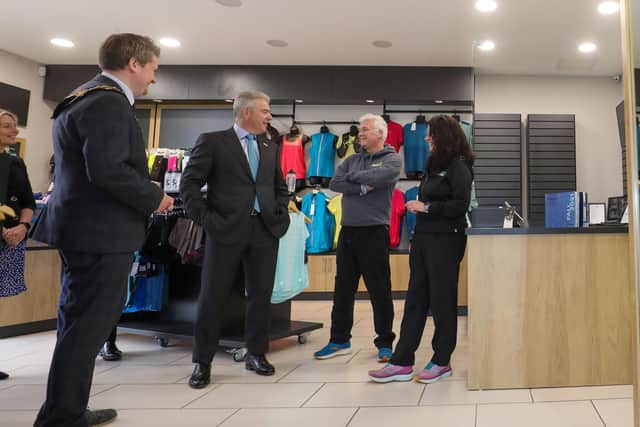 Michael Stewart from The Running Bubble, Lisburn chats to the Secretary of State for Northern Ireland, Brandon Lewis and the council representatives about their new business offering support to runners.