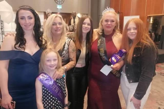 Suzi McCraken (Fit Moms volunteer), Leanne, Lesley with her daughters and Jersi-Rae (purple sash).