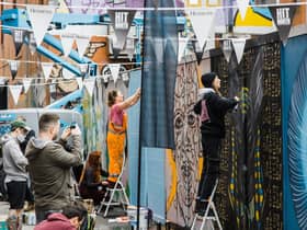 Renowned international and local artists have left their mark on Belfast with over 50 new murals now adorning walls across the city as part of the 2022 Hit the North Street Art Festival, supported by Hennessy. Pictured painting at HTN is HM Constance, Laura Nelson and Kerrie Hanna.
