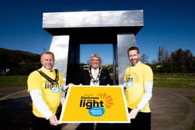 Mayor, Cllr Billy Webb (centre), alongside Deputy Mayor Cllr Stephen Ross (left) and Deaglan O'Hagan.