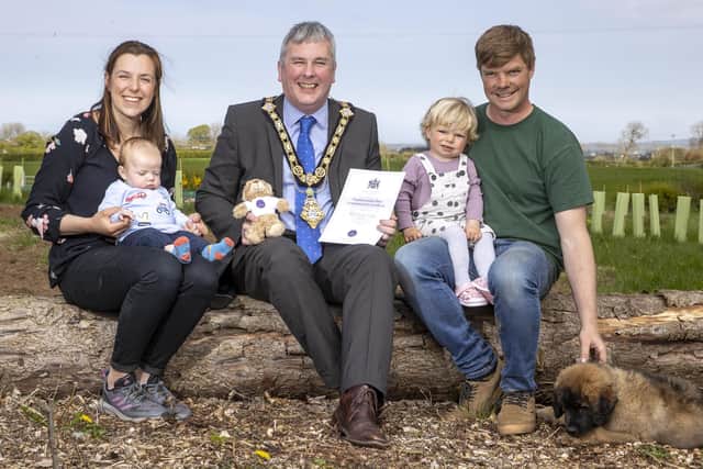 The Mayor of Causeway Coast and Glens Borough Council Councillor Richard Holmes pictured with Hannah and Kyle McAuley, and their children Albert and Harper. Albert, who was born on February 6th 2022, 70 years after HM The Queen’s accession, was presented with a special Jubilee teddy bear and certificate to mark this special date