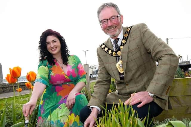 Pictured is Mayor Cllr William McCaughey and Lynsey Poole from Larne Area Community Support Group launching Councils 'In Bloom Community Competition'.