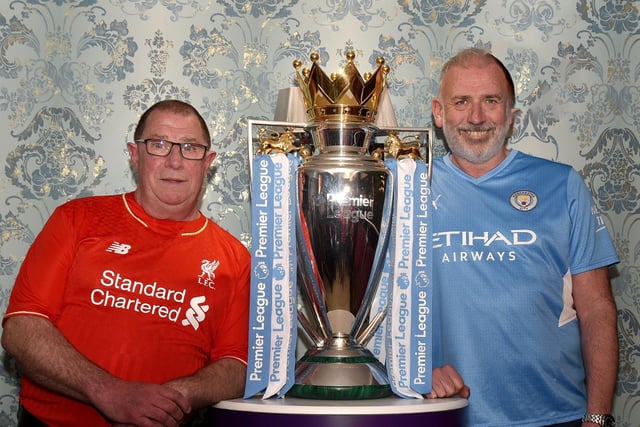 Jim McVeigh, left, and Martin McCann whose teams are fighting it out for the EPL title were happy to pose together with the Premiership trophy last week. INPT18-210.