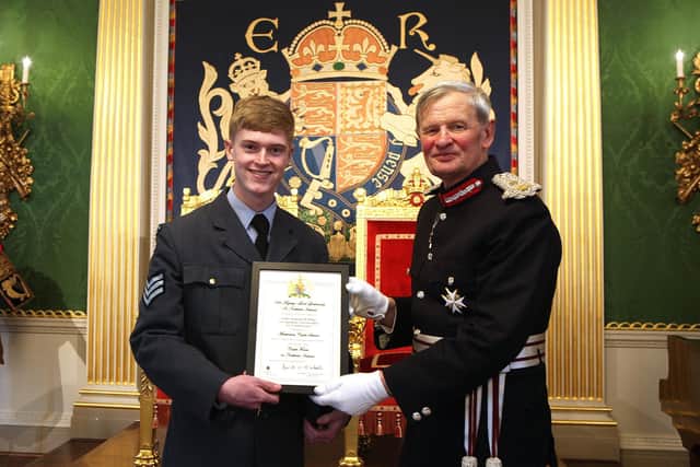 Pictured at the Hillsborough Castle ceremony Cadet Sergeant Rhys Millar from Carrickfergus receives the Citation to mark his appointment as Her Majesty’s Lord Lieutenant’s Cadet from Mr David McCorkell, Her Majesty's Lord Lieutenant for County Antrim.