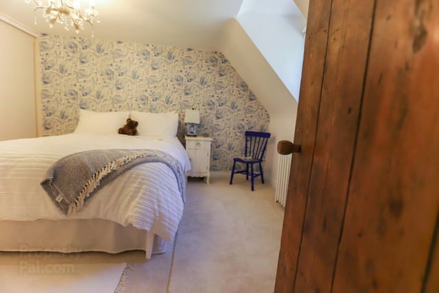 One of the two bedrooms in this beautiful cottage.