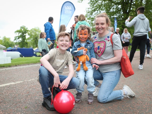 Press Eye - Belfast - Northern Ireland - 7th May 2022 -
Mariane, James and Anna Murray at the Lisburn & Castlereagh Mayor's Carnival Parade and Family Fun Day.
Groups and organisations within the Lisburn and Castlereagh community joined with the council to bring a very successful 'Rainbows and Umbrellas - Brighter Days Ahead' Mayor's Carnival Parade and Family Fun Day to the city. Over 11,000 enjoyed the day which culminated in Wallace Park with musical, crafts, horticulture and funfair amusements to name a few of the activities.
Photo by Kelvin Boyes / Press Eye.