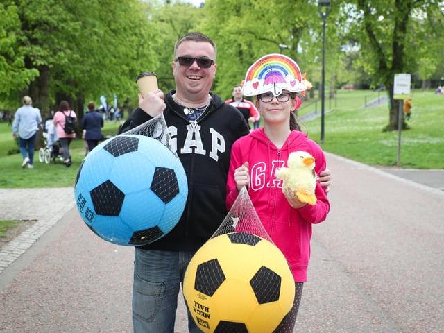 Press Eye - Belfast - Northern Ireland - 7th May 2022 -
Zsolt and Sophie Bodor at the Lisburn & Castlereagh Mayor's Carnival Parade and Family Fun Day.
Groups and organisations within the Lisburn and Castlereagh community joined with the council to bring a very successful 'Rainbows and Umbrellas - Brighter Days Ahead' Mayor's Carnival Parade and Family Fun Day to the city. Over 11,000 enjoyed the day which culminated in Wallace Park with musical, crafts, horticulture and funfair amusements to name a few of the activities.
Photo by Kelvin Boyes / Press Eye.