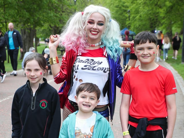Press Eye - Belfast - Northern Ireland - 7th May 2022 -
Maddox McBride, Myles McBride Riley McDowell with 'Harley Quinn' at the Lisburn & Castlereagh Mayor's Carnival Parade and Family Fun Day.
Groups and organisations within the Lisburn and Castlereagh community joined with the council to bring a very successful 'Rainbows and Umbrellas - Brighter Days Ahead' Mayor's Carnival Parade and Family Fun Day to the city. Over 11,000 enjoyed the day which culminated in Wallace Park with musical, crafts, horticulture and funfair amusements to name a few of the activities.
Photo by Kelvin Boyes / Press Eye.