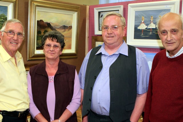 John Maddock, Wendy McIlroy, Robert McIlroy and Robert Thompson pictured at the Dunluce Parish Church art Exhibition in the Parish hall in Bushmills. Pic Kevin McAuley