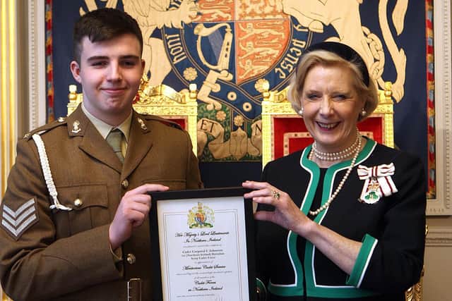 Chris is pictured at the Hillsborough Castle ceremony, receiving his Award and congratulations from Mrs Alison Millar, Her Majesty’s Lord Lieutenant for the County of Londonderry