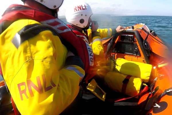 Volunteer crew members on board the  in-shore lifeboat.