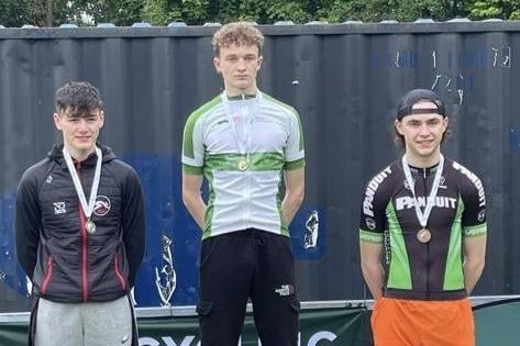 Curtis Neill on the podium at Orangefield