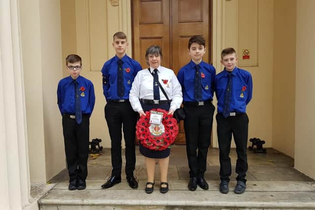 Frances pictured with members of 7th Newtownabbey in London.