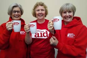 Coleraine supporters of Christian Aid celebrate the success of women in Zimbabwe who have overcome drought to provide for their families by growing drought-tolerant hibiscus tea. L-R, Irene Kinghan, Pauline Connor and Ann Kirkland are members of Terrace Row Presbyterian Church in Coleraine. Credit: Helen Newell/Christian Aid