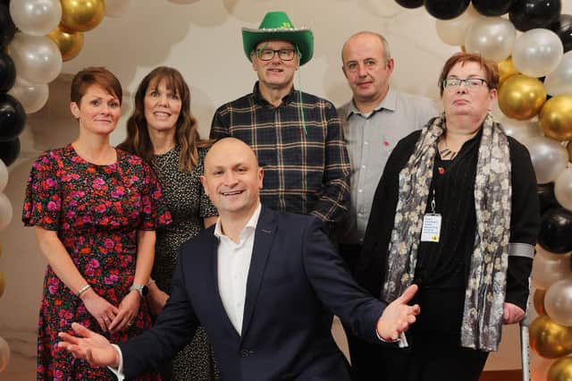 Five colleagues from Asda Coleraine who received long service awards are: Back l-r: Christine O’Kane (30 years), Lesley Lynn (30 years), Sam Taggart (25 years), Tony Lamont (25 years), Josephine Reeves (25 years). Front: George Rankin, Snr Director Asda NI