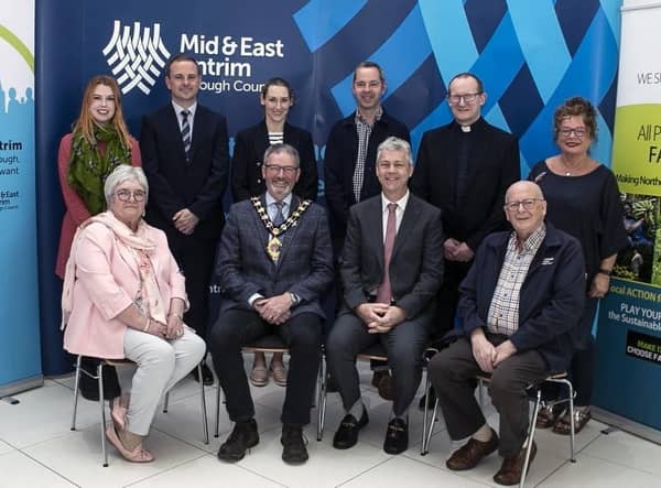 Members of Mid and East Antrim's Fairtrade Steering Group with Reverend Adrian Halligan and Dr Christopher Stange, Consulate General for Saint Vincent and the Grenadines.