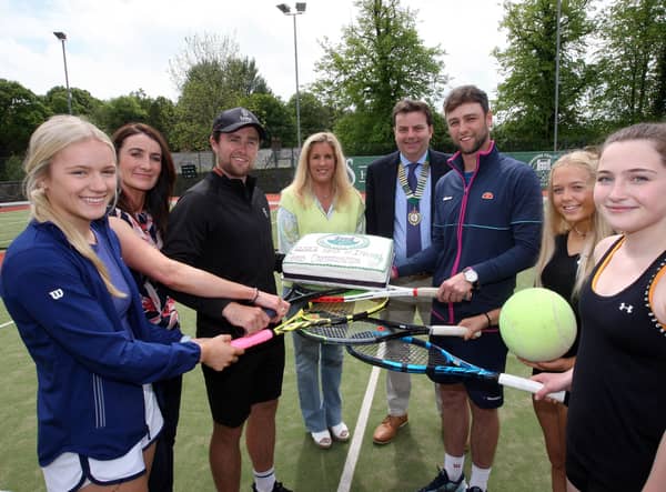 Serving up a slice of the action at the launch of the 2022 Kirk’s Bakery North of Ireland Tennis Championships at Downshire Tennis Club, Hillsborough is defending champion and former Davis Cup player Peter Bothwell accompanied by players Amber Young, Downshire Tennis Club captain Sharon Dennison, sponsor Sonya Kirk, president of Ulster Tennis Greg O’Rawe, Sam Bothwell, Isabella Connor and Maggie Gilmartin. The championships run from 11th to 18th June. Picture by Freddie Parkinson