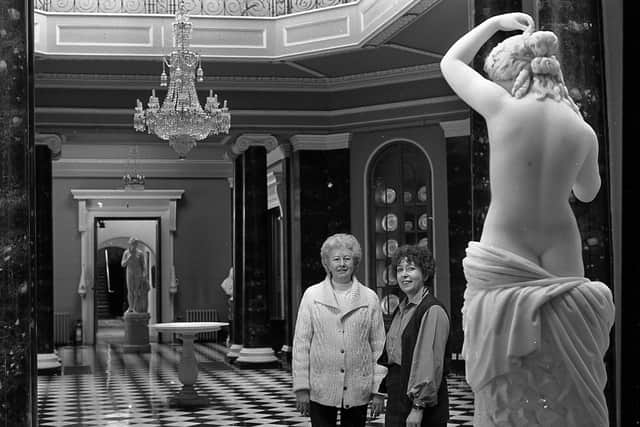 Myrtle Watson shows the News Letter’s Nikki Hill the marble statues at the Natrional Trust’s Mount Stewart in May 1982. Mrytle was the wife of the custodian of the house Sydney Watson. She told the News Letter: “The dusting is done very carefully and well. We do have other ways of dusting of course. The marble statues are dusted with a rather special soft bristle brush which gets into the crevices and layers of the sculpture.” Meanwhile, polishing was done once a year only with a special National Trust beeswax polish. Picture: News Letter archives