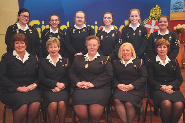 Girls from 213th NI Brookside Presbyterian, 247th NI First Clough
Presbyterian, 251st NI Glenwherry Presbyterian Girls’ Brigade and 190th NI Bellaghy pictured with their Girls’ Brigade company leaders and Isobel McKane, GBNI President.