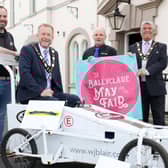 The Mayor, Councillor Billy Webb and Deputy Mayor, Councillor Stephen Ross,  with the sponsors of the popular Soap Box Derby event, at the launch of  the May Fair.
