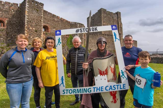 Gemma Brown, Mid and East Antrim Council;  Susan Kane, Seapark AC race volunteer;  Lesley Wright, Aware NI; Jack Creighton, Ownies Bar and Bistro; Seapark ‘Knight’, Bobbie Irvine; Andy Smyth, race director, Seapark AC and young runner Mark McCracken.