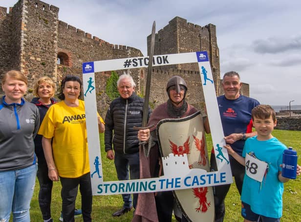 Gemma Brown, Mid and East Antrim Council;  Susan Kane, Seapark AC race volunteer;  Lesley Wright, Aware NI; Jack Creighton, Ownies Bar and Bistro; Seapark ‘Knight’, Bobbie Irvine; Andy Smyth, race director, Seapark AC and young runner Mark McCracken.