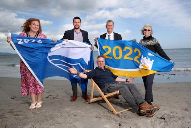 Pictured at the announcement of the Blue Flag and Seaside Awards are the Deputy Mayor of Causeway Coast and Glens Borough Council Councillor Ashleen Schenning, DAERA Minister, Edwin Poots, Harbourmaster John Morton, Dr Sue Christie, Chair, Keep Northern Ireland Beautiful and Coast and Countryside Officer Michael McConaghy (seated)