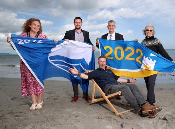 Pictured at the announcement of the Blue Flag and Seaside Awards are the Deputy Mayor of Causeway Coast and Glens Borough Council Councillor Ashleen Schenning, DAERA Minister, Edwin Poots, Harbourmaster John Morton, Dr Sue Christie, Chair, Keep Northern Ireland Beautiful and Coast and Countryside Officer Michael McConaghy (seated)