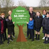 Ballymacricket Primary School pupils, (from left to right) Sophia Y6, Dáithí Y7, Ria Y5, Matthew Y5, Sophie Y7 and Ciara Y6, are joined by Centra Ballinderry owner Anne Kennedy and son Chris Kennedy, plus Y7 teacher Jacqueline McAllister (right)