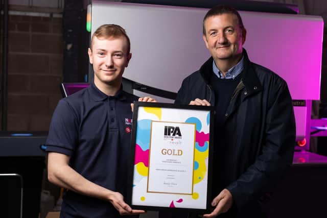 Lee Bradley, Northside Graphics, who has been  named ‘Print Media Apprentice of the Year’ at the recent 43rd Irish Print Awards in Dublin. pictured with Ian Cairns, Belfast Met