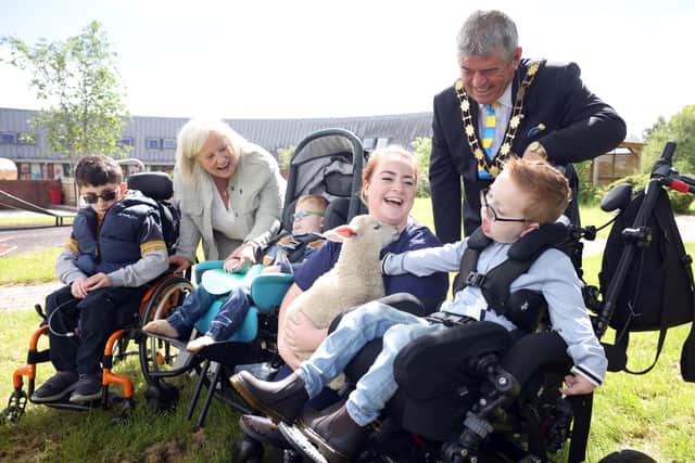Jack McCrystal (13) from Draperstown, Theo Walker (4) from Belfast and James McKinney (5) from Belfast joined Cllr Billy Webb, NI Hospice Chief Executive, Heather Weir and Hospice nurse Louise Devlin.