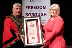 Heather Weir, Chief Executive of the NI Hospice accepts the Freedom of the Borough award on behalf of the charity from Mayor of Antrim and Newtownabbey Cllr Billy Webb.