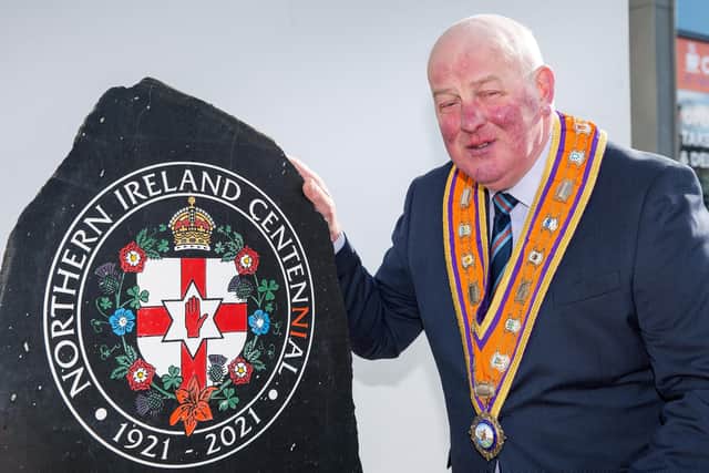 Grand Master Most Wor. Bro Edward Stevenson pictured with the CentenNIal stone at Schomberg House.  Picture: Graham Baalham-Curry