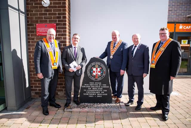 Grand Master Most Wor. Bro. Edward Stevenson; Wor. Bro. Grand Secretary Rev. Mervyn Gibson; Grand Treasurer Wor. Bro Brian Dorrian pictured at the unveiling of the CentenNIal stone at Schomberg House in March with DUP Leader Sir Jeffrey Donaldson and TUV Leader Jim Allister.  Picture: Graham Baalham-Curry