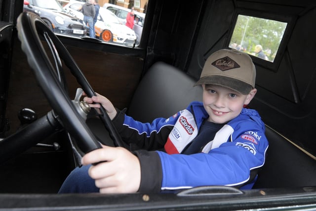 Car Show, Banbridge Civic Building 18th May 2022 in aid of the Lord Mayors Charities - Angel Wishes and Guide Dogs. Micah Wilson behind the wheel of a 1929 Ford Pick Up.  ©Paul Byrne Photography
