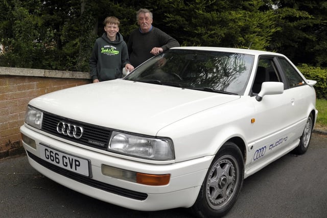 Car Show, Banbridge Civic Building 18th May 2022 in aid of the Lord Mayors Charities - Angel Wishes and Guide Dogs. William Copeland and Grandson Jack at their 1990 Audi Quattro.  ©Paul Byrne Photography