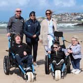 (Back row) Chris Thompson from the National Trust; Alix Crawford, Chairperson for the Mae Murray Foundation and Anna Corry of Blossoming Birds joined (front row) Conor O’Kane, a facility user and board member of the Mae Murray Foundation and Saul Wilton and his mum Jane Stewart as it is announced that Portstewart is now an Inclusive Beach following a fundraising campaign, led by Anna Corry.