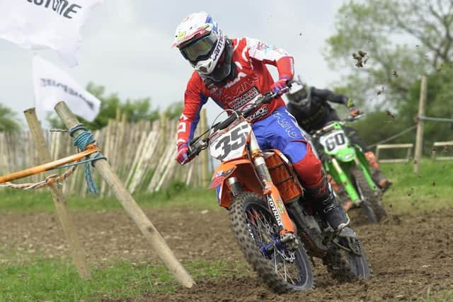 Jordan McCaw on his Suitor Autofix 2022 450 KTM being chased down by number 60 John Meara. Jordan took third place in the Group One Races overall and second place in the Brian Bell Memorial Race