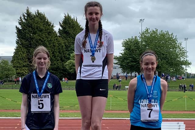 The star of the show at the recent Ulster Championships in Antrim was Banbridge Academy's junior girl high jumper Ciara Patton, centre of picture, who jumped brilliantly to win the Ulster title
