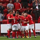 Larne players congratulating Ronan Hale following his goal against Bala Town in the UEFA Europa Conference League first round qualifier at Inver Park in July 2021. Pic by Pacemaker.