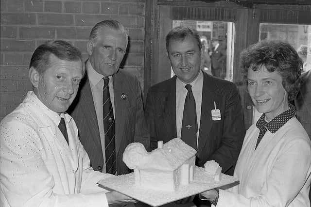 Pictured at the Balmoral Show in May 1982 is Mrs Jane Prior, wife of the Secretary of State, receiving a butter sculpture on the Milk Marketing Board stand from Mr John Blaney. Included are Mr John Lynn (second left), chairman of the board, and Mr George Chambers, managing director. Picture: Farming Life/News Letter archives