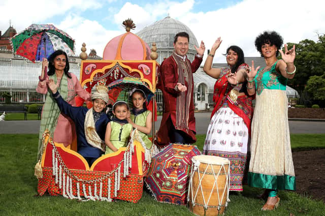 Belfast Mela will be hosted by U105's Carolyn Stewart and UTV's Paul Reilly who are pictured in Botanic Gardens with ArtsEkta founder Nisha Tandon, bollywood dancer Dona Das Gupta and  Noah (9) Amelia (8) and Aria (4). Photo by William Cherry / Press Eye