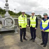 Pictured (L-R) at the Ballylumford power station is: Gerard McIlroy, Finance Director at Mutual Energy, Economy Minister Gordon Lyons and David Surplus, CEO, B9 Energy. Mutual Energy and B9 Energy are part of the Ballylumford Power-to-X project collaboration which aims to create a full-cycle hydrogen economy, from production and storage through to distribution and usage, at the site and beyond.