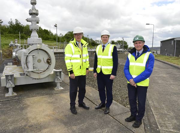 Pictured (L-R) at the Ballylumford power station is: Gerard McIlroy, Finance Director at Mutual Energy, Economy Minister Gordon Lyons and David Surplus, CEO, B9 Energy. Mutual Energy and B9 Energy are part of the Ballylumford Power-to-X project collaboration which aims to create a full-cycle hydrogen economy, from production and storage through to distribution and usage, at the site and beyond.