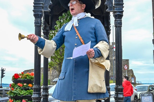 Town Crier Godfrey Robinson reading the official proclamation of the platinum jubilee events, at the Big Lamp in Carrickfergus town centre. Carrick photos: simongraham.photography.