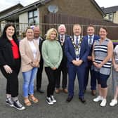 The Deputy Lieutenant of Co. Antrim Mr James Perry MBE;  David McCrea, chair of Monkstown Community Association (Jubilee Centre); the  Mayor of Antrim and Newtownabbey, Councillor Stephen Ross; Cllr Mark Cooper, Brittany Cooper,  Elizabeth Sherman, Jessica Cooper, Clare Patterson and Alison Cooper pictured during the event at Monkstown. Pictures By: Arthur Allison/Pacemaker Press.