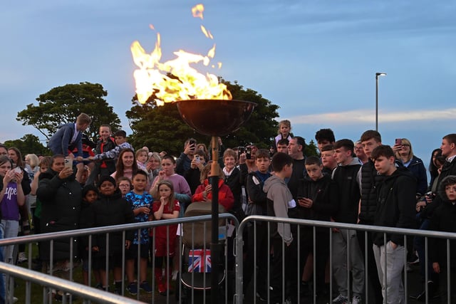 Crowds gather for the beacon lighting in Larne. Picture: Stephen Hamilton/Presseye
