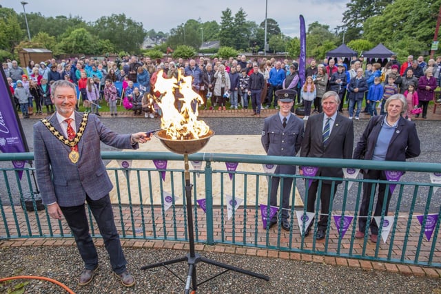 Mayor of Mid and East Antrim, Councillor William McCaughey, lights the Jubilee beacon at the People's Park in Ballymena.