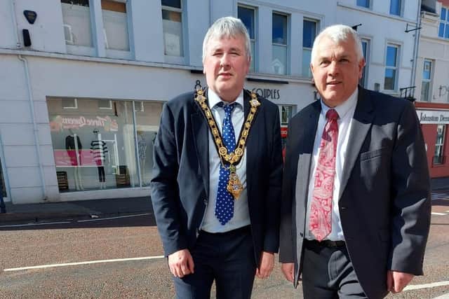 The Mayor of Causeway Coast and Glens Borough Council Councillor Richard Holmes pictured at the site of the memorial stone on Railway Road in Coleraine, along with Councillor Alan McLean who first proposed the motion